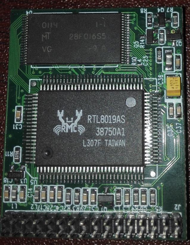 RTL8019AS and MT28F016S5 side of a customer made AR168M VoIP module